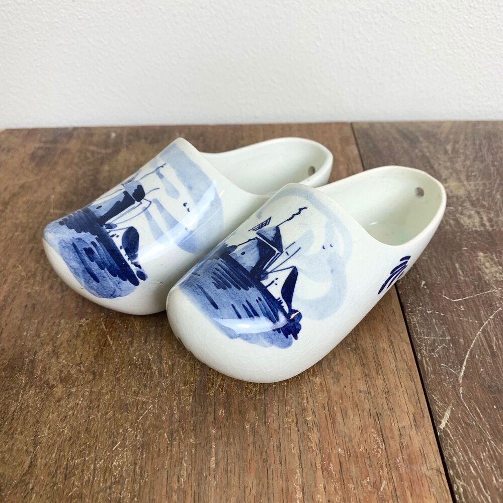 Pair of vintage hand painted white blue Delft Holland scenic ceramic clogs